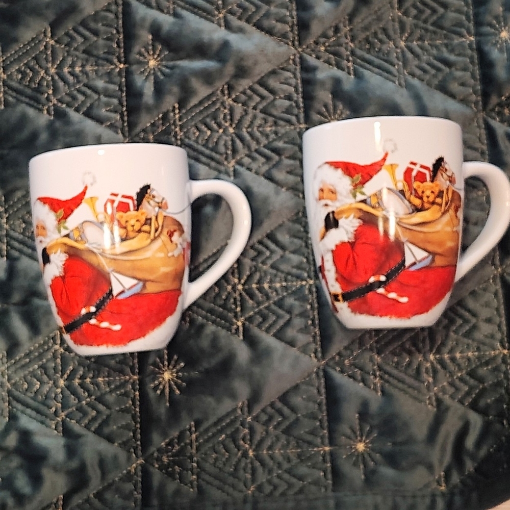 Santa Claus with Bag Full Of Toys Christmas Mugs Set Of 2. By Mary Lake-Thompson